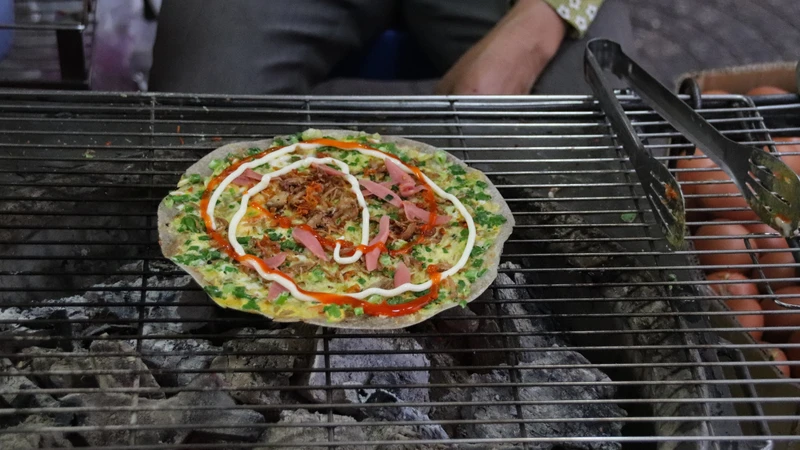 Lượng calo trong bánh tráng nướng phụ thuộc vào nhiều yếu tố