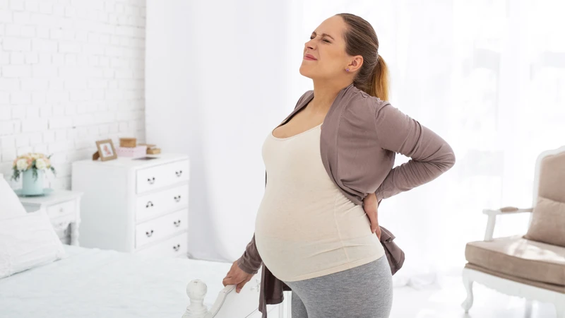 Không phải mẹ bầu nào cũng bị đau lưng khi có máu báo thai