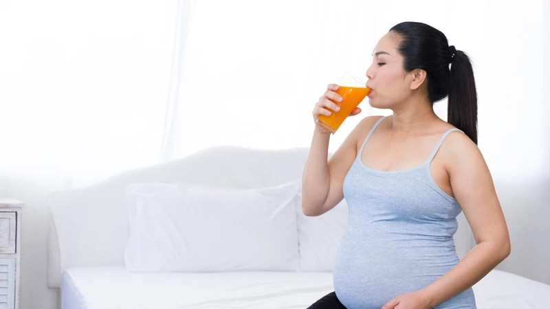 Đường tự nhiên trong nước cam giúp mẹ bầu chống lại cảm giác mệt mỏi