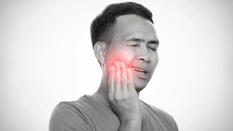 Đau, sưng, hôi miệng khi mọc răng khôn là dấu hiệu nên đi khám