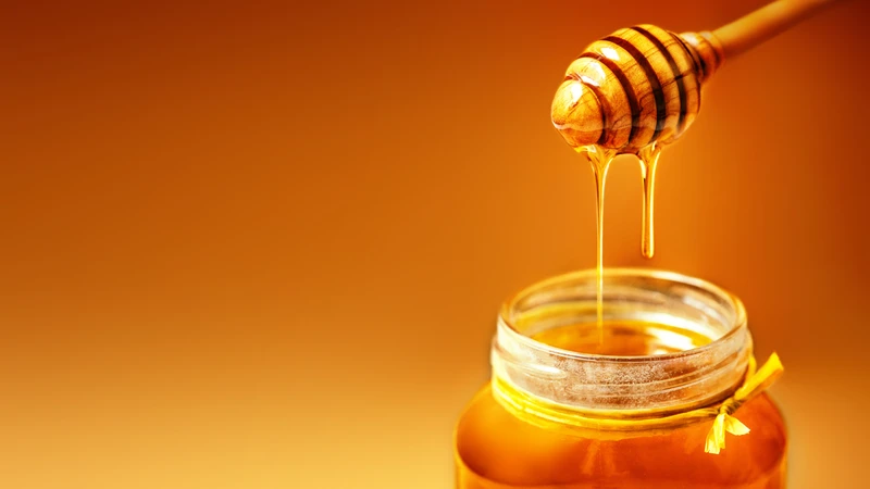 Một thìa mật ong Manuka mỗi sáng giúp làm dịu niêm mạc dạ dày