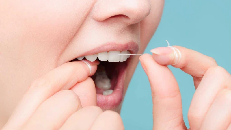 Tập thói quen sử dụng chỉ nha khoa để làm sạch miệng của bạn